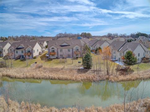 Condo Overlooks Pond